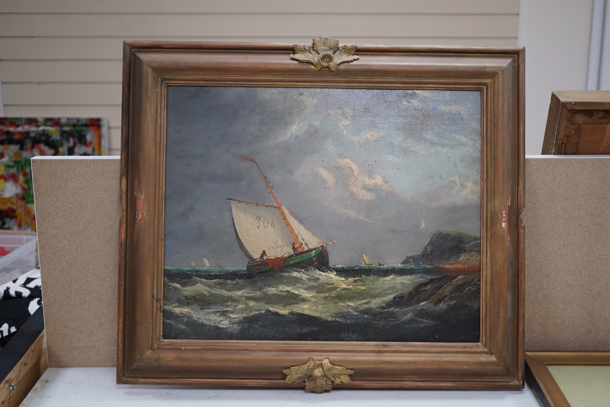 J Ray, oil on board, Sailing ships on a choppy sea, signed, 36 x 46cm. Condition - fair